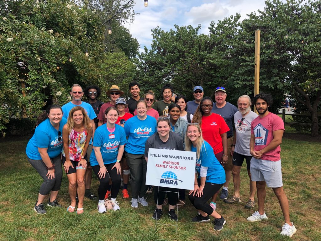 A photo of the BMRA team at the Willing Warriors event where BMRA is a Warrior Family Sponsor. The photo includes many folks from CEO Gray Coyner to former employees.